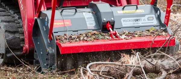 Close Up of Seppi Miniforst Cl 150 Attached To Skid Steer Outside