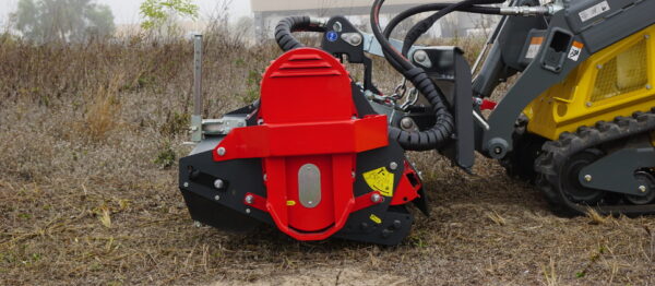 SWMA skid steer attached to heavy-duty machine