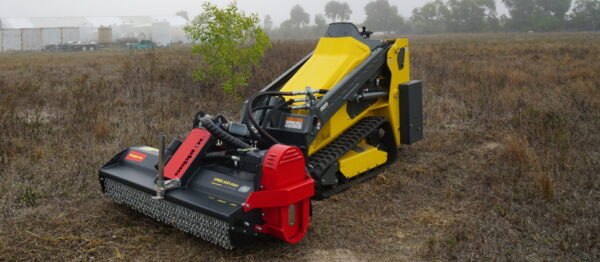 SWMA skid steer attached to heavy-duty machine