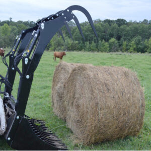 Top Dog Bale Grapple Outside Next To Bales Of Hay