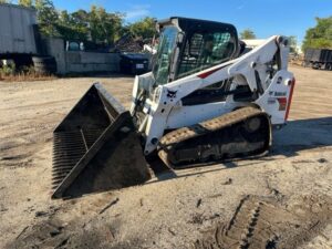 Top Dod XI Firewood Bucket On Skid Steer Outside