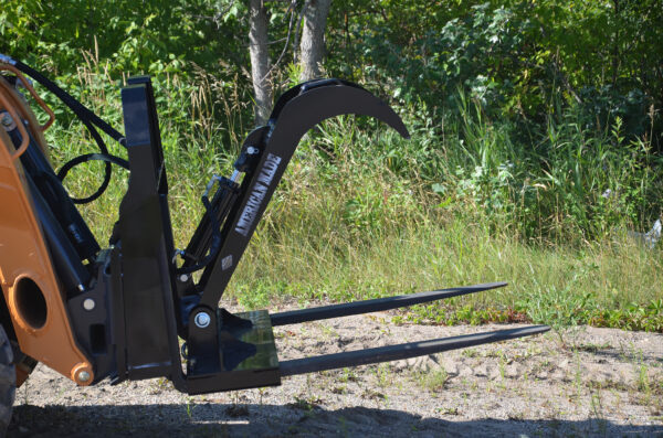 Top Dog Pallet Fork Grapple Attachement On Skid Steer Outside