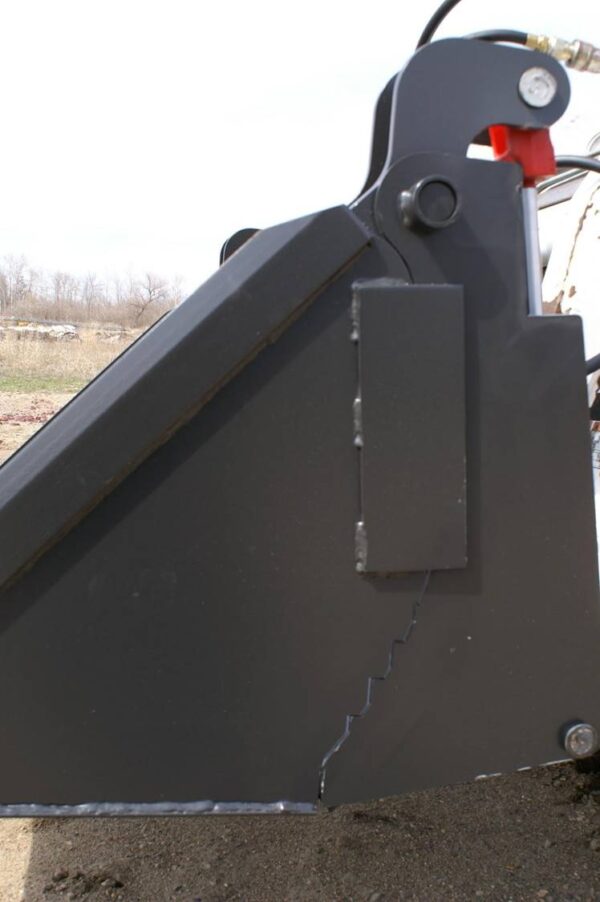 Close Up Of Top Dog 4 In 1 Bucket Outside