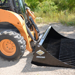 Top Dog 62 Inch Rock Bucket Outside On Skid Steer