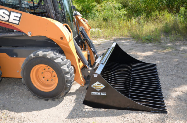 Top Dog 62 Inch Rock Bucket Outside On Skid Steer