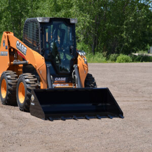 Top Dog Tuff Tooth Bucket Attachment On Skid Steer Outside